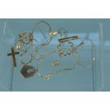 A collection of 9ct gold/yellow metal jewellery including lockets, woven chains,