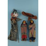 A vintage (possibly Thai) puppet with moveable head and arms (as found) plus two Native American