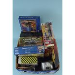 Various boxed games and jigsaws including Star Wars Trivial Pursuit, Star Trek Phaser,