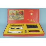 A boxed Triang 00 gauge electric model railroad set RS12 (contents playworn and box damaged)