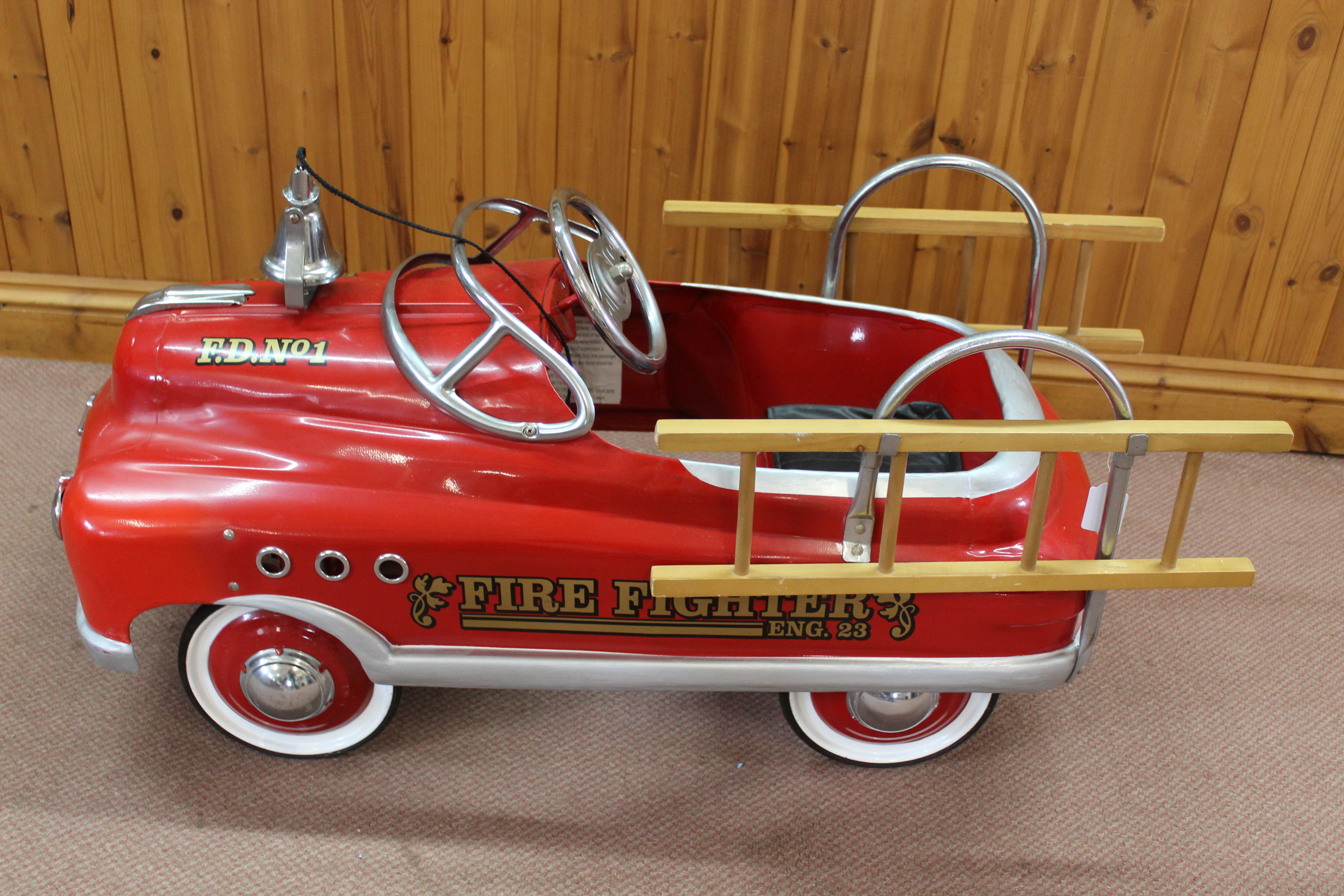 A 1950's style fire fighter Eng 23 F.D. No.