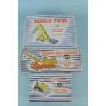 A Dinky Toys 961 Bulldozer, 464 Elevator Loader and 972 20 ton lorry mounted crane,