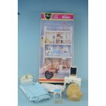 A boxed 1970's Sindy house with additional bedroom furniture