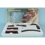 A boxed Hornby 'Country Local' set R671 (box with damage)