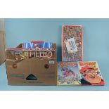 A box of mixed vintage games, jigsaws,