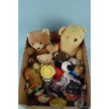 A box of various soft and plastic toys including two Paddington money boxes etc