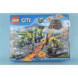 A Lego City boxed set 60124 'Volcano Exploration' (contents disturbed and box with wear)