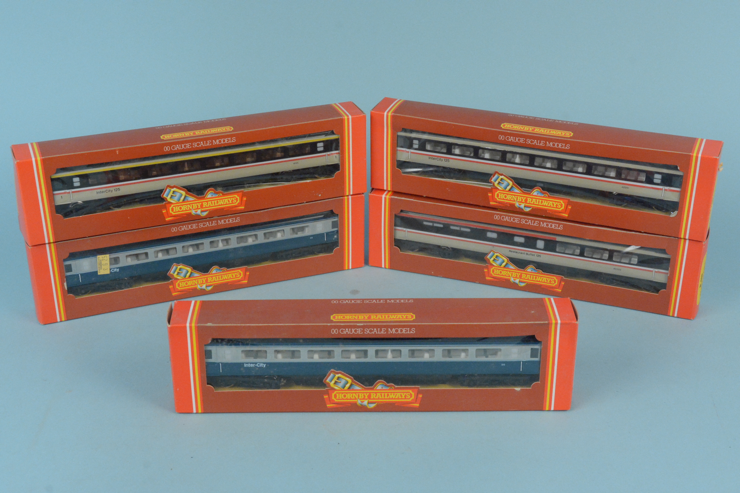 Five boxed Hornby coaches and buffet car