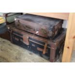 A good quality leather and canvas travelling trunk and a leather suitcase