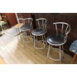 Four assorted chrome bar stools