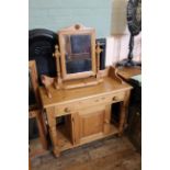 A modern pine washstand with dressing mirror to top