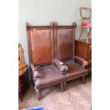 A pair of late 19th Century carved oak Master's chairs with leather upholstery