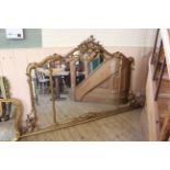 A late 19th Century gilt overmantel mirror of large proportions (W- 345cm,