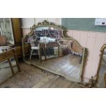 A substantial painted overmantel mirror with etched glass decoration