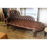 A late 19th Century beech and leather chaise longue, approx.