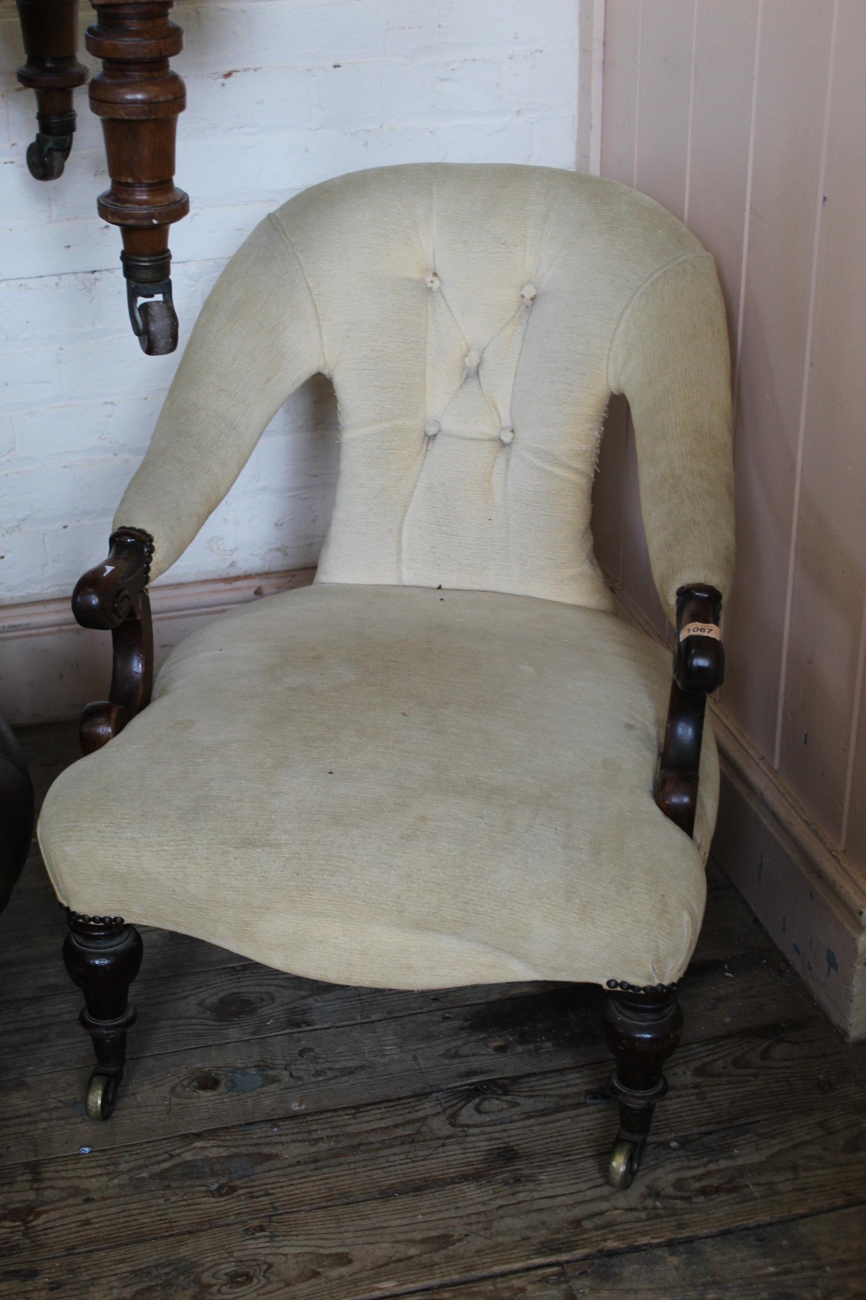 A mid Victorian mahogany low armchair