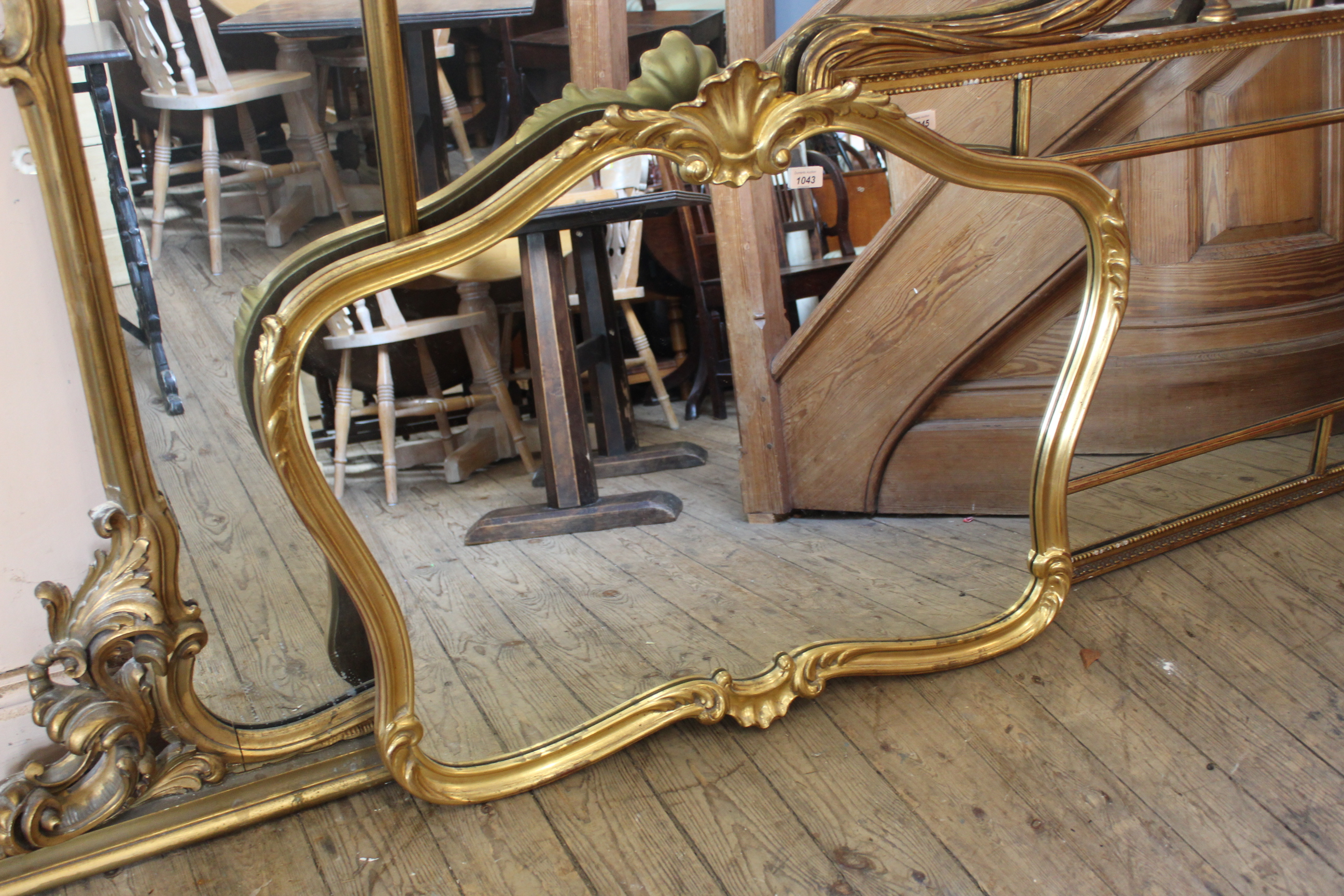 A decorative gilt framed wall mirror