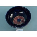 A Moorcroft Anemone pattern footed dish with blue signature and paper label to base, 16.