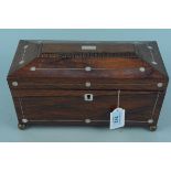 A Victorian rosewood and mother of pearl inlaid double tea caddy with etched glass mixing bowl on
