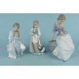 Three Nao porcelain figurines