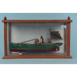 A handmade model in a glass case of the Great Yarmouth Drifter Lydia Eva YH89