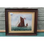 An early 20th Century framed and glazed oil on board of the Thames barge 'The Waterlily',