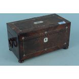 A 19th Century mother of pearl inlaid rosewood tea caddy with twin lidded lift out canisters,