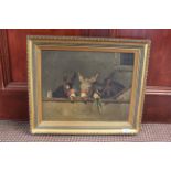 A late 19th Century oil on canvas of three donkeys in a stable (indistinctly signed),