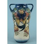 A Moorcroft 'Anna Lily' 1998 pattern vase, 26cm tall (no damage noted)