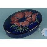 A Moorcroft 'Anemone' pattern lidded pot with impressed mark,