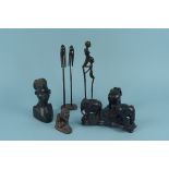 A group of assorted carved wooden figurers of tribesmen,