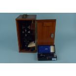A boxed vintage school laboratory room microscope by Cooper Troughton & Simms plus 'The Keeler