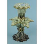 An early 20th Century continental pottery table centrepiece in green Majolica colours (as found)