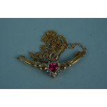 A 10ct gold ruby and diamond pendant on chain, weight approx 2.