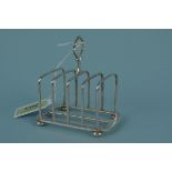 A silver five bar toast rack, hallmarked Birmingham 1925, maker Hukin & Heath,