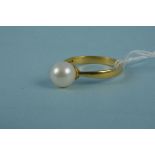 A 22ct gold ring set with single pearl, size M, weight approx 2.