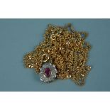 Two 9ct gold chains plus a small 9ct gold diamond and ruby set cluster pendant, weight approx 7.