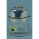 A large Victorian silver lidded glass dressing table jar with gilt interior,