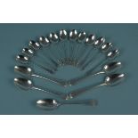 A set of six silver apostle teaspoons plus eleven other silver spoons including Georgian,