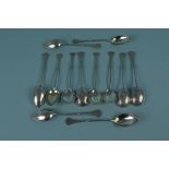 Two sets of six Russian silver spoons, all with engraved decoration to backs,