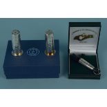 A pair of silver novelty salt and pepper in the form of shotgun cartridges,