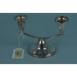 A silver two arm candelabra