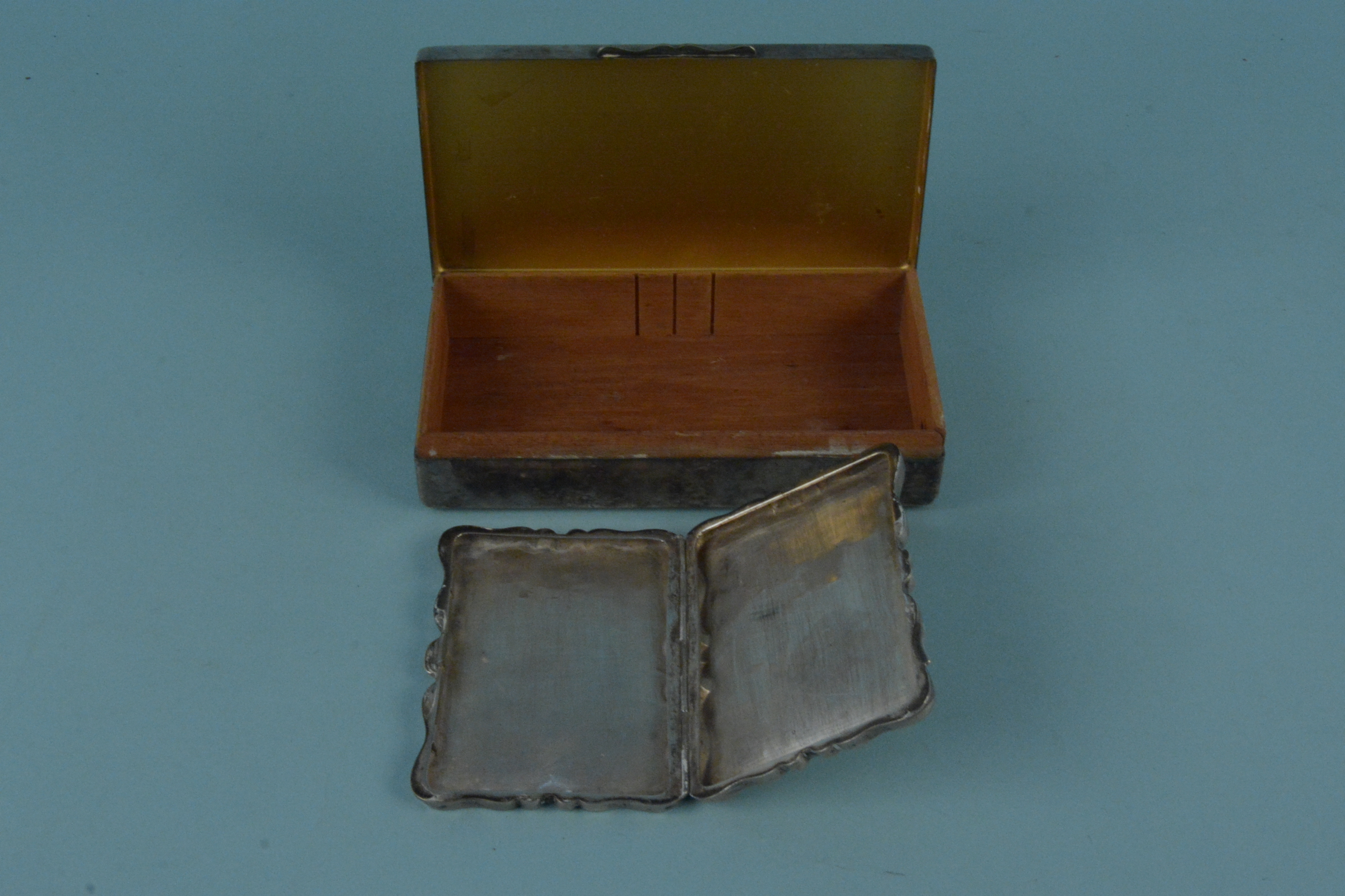 A silver card/cigarette case with foliate engraved detail and engraved monogram to centre (heavily - Image 2 of 3