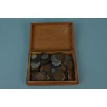 A mixed lot of British coins in a box (few silver)
