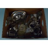 A quantity of silver plated items, including cups, sugar, sauce boat,