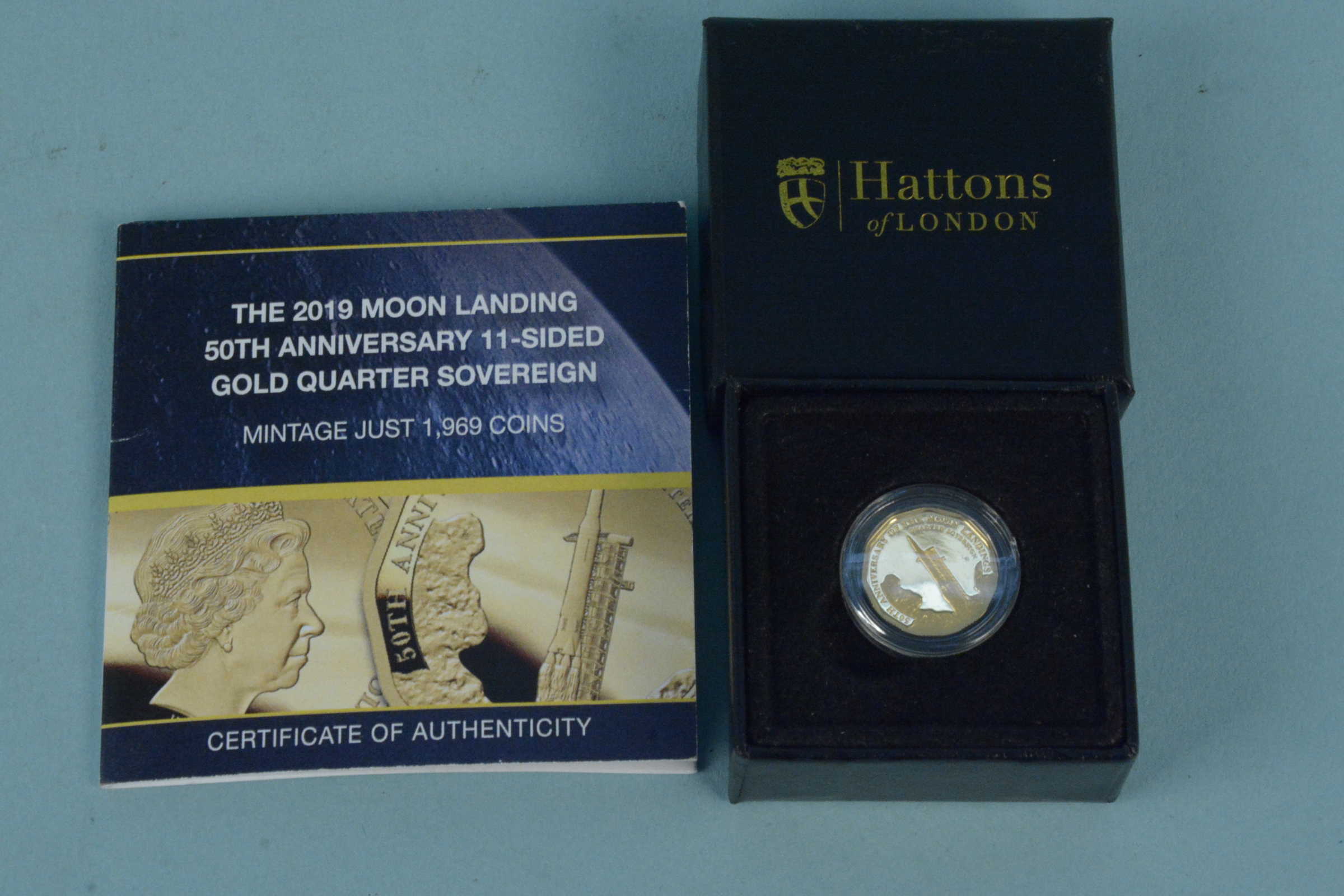 A 2019 moon landing 50th anniversary 22ct gold uncirculated quarter sovereign,