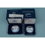 A 2007 America Eagle one ounce silver proof dollar coin plus a Jamestown 400th anniversary silver