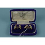 A pair of 18ct gold diamond cufflinks, each shaped end set with single diamond with bar link,