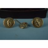 A pair of circular 9ct gold bull design cufflinks with matching tie pin, weight approx 11.