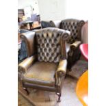 A pair of mid 20th Century leather Queen Anne style armchairs